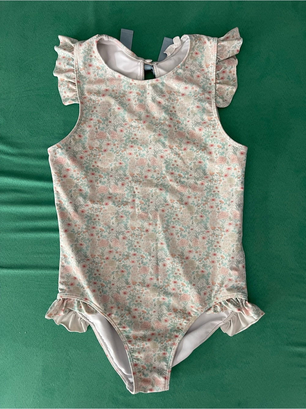 Minnow girls emerald floral ruffle sleeve rashguard one piece, size 11/12 EUC